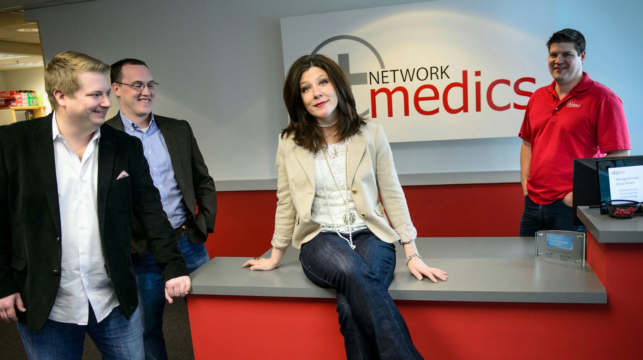 Gina Soleil with owners of Network Medics, one of the companies she helped. Owners , L to R James Matheson, Kevin Calgren and Patrick Massey. Thursday, February 13, 2014 ] GLEN STUBBE * gstubbe@startribune.com
