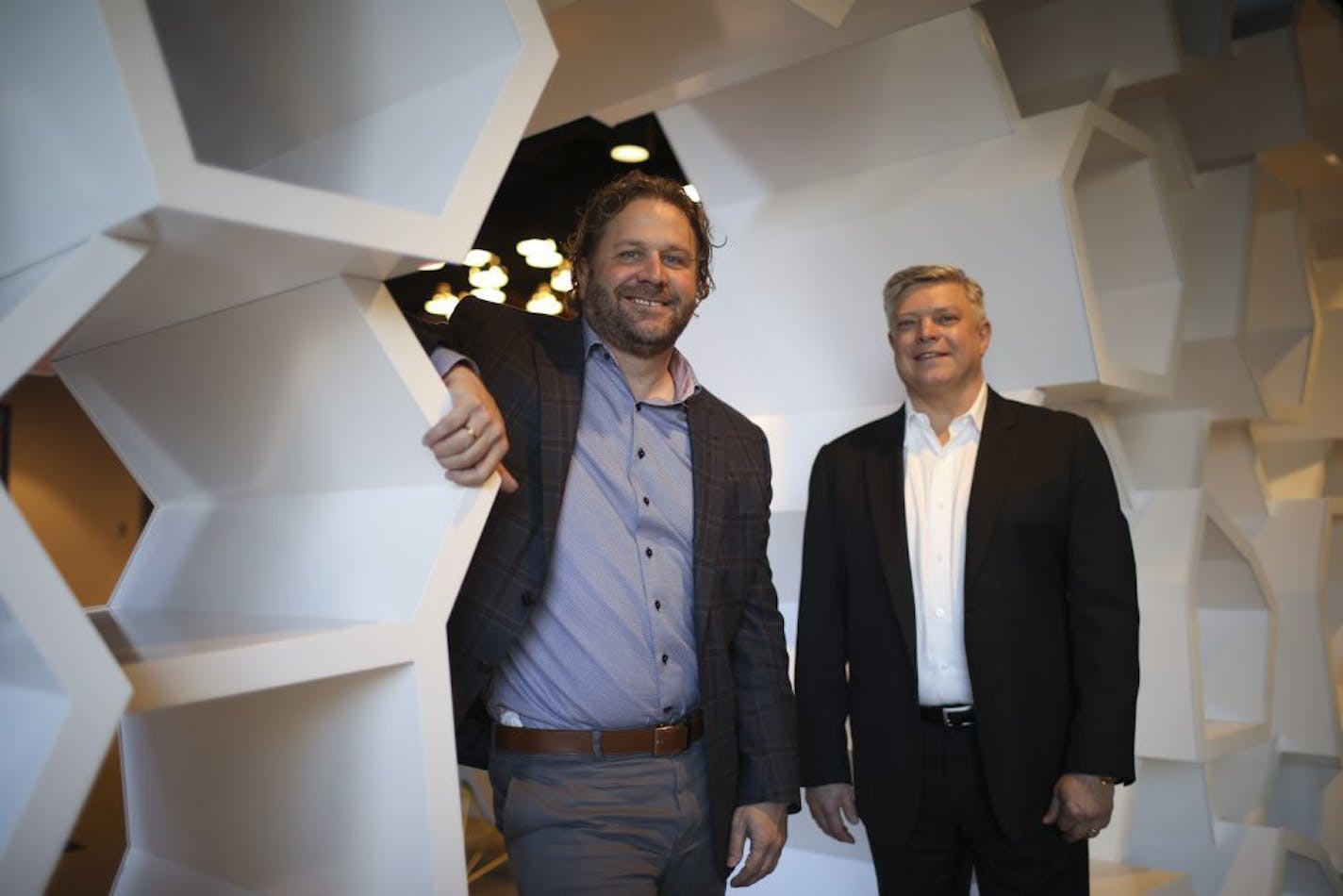 Josh Hoffman, left, and Ken Greene of the Carlso Rezidor Hotel Group at the company's Radisson RED property in downtown Minneapolis.