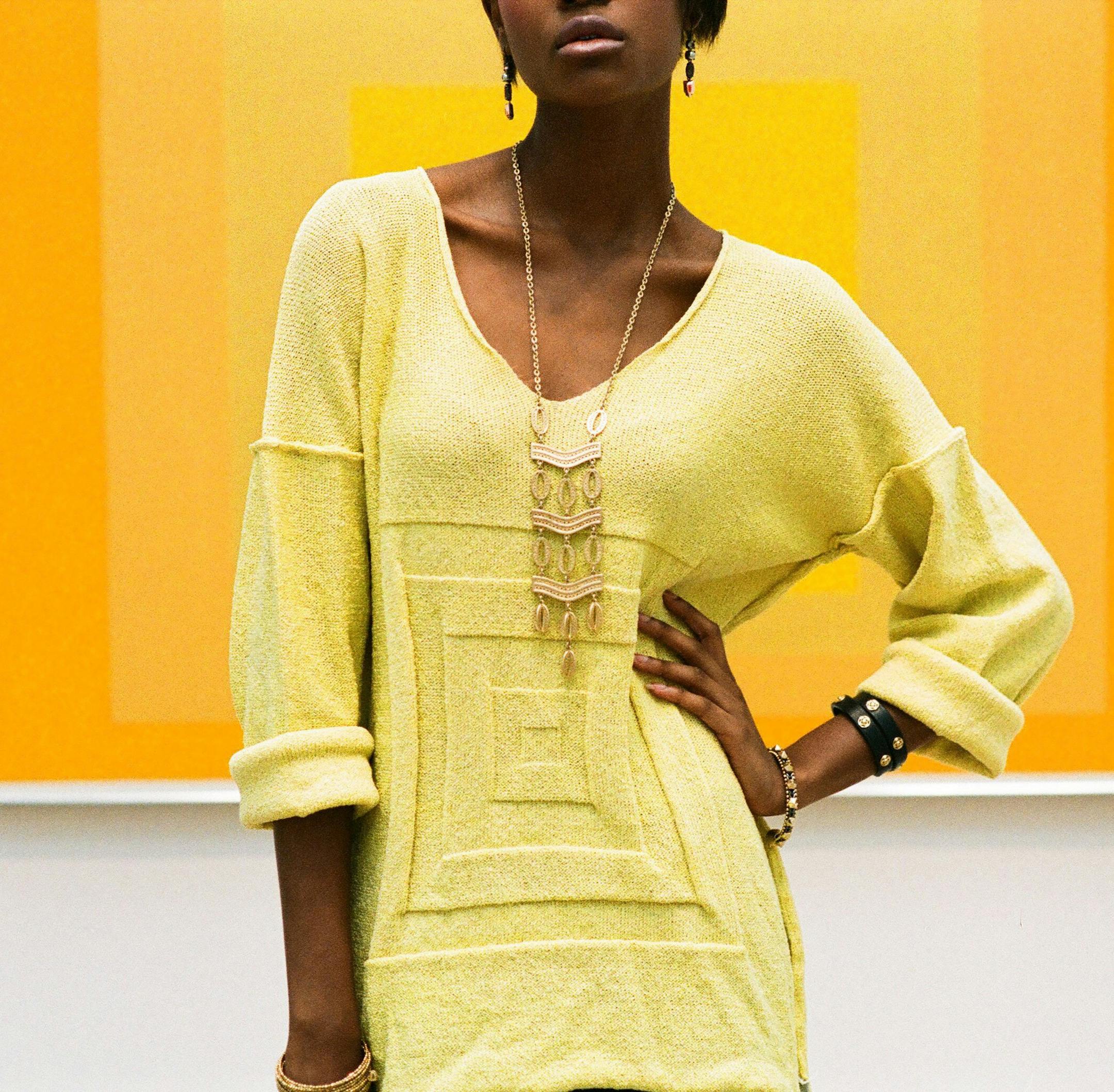 Tara stands in front of 'Homage to the Square: Wondering,' 1964, by Josef Albers. She wears a yellow sweater with geometric shapes ($360) at Skif International, 314-773-4401; faux leather mini by Greylin ($98) at Ivy Hill, www.ivyhillboutique.com; Kimberly necklace ($89), Clover Double Wrap leather bracelet ($59), Artemis Cuff ($69), Bardot Spiral Bangle ($59), Kahlo Linear 2-inch drop earrings ($39) all from Stella & Dot, www.stelladot.com. (Erik M. Lunsford/St. Louis Post-Dispatch/MCT) ORG XMI