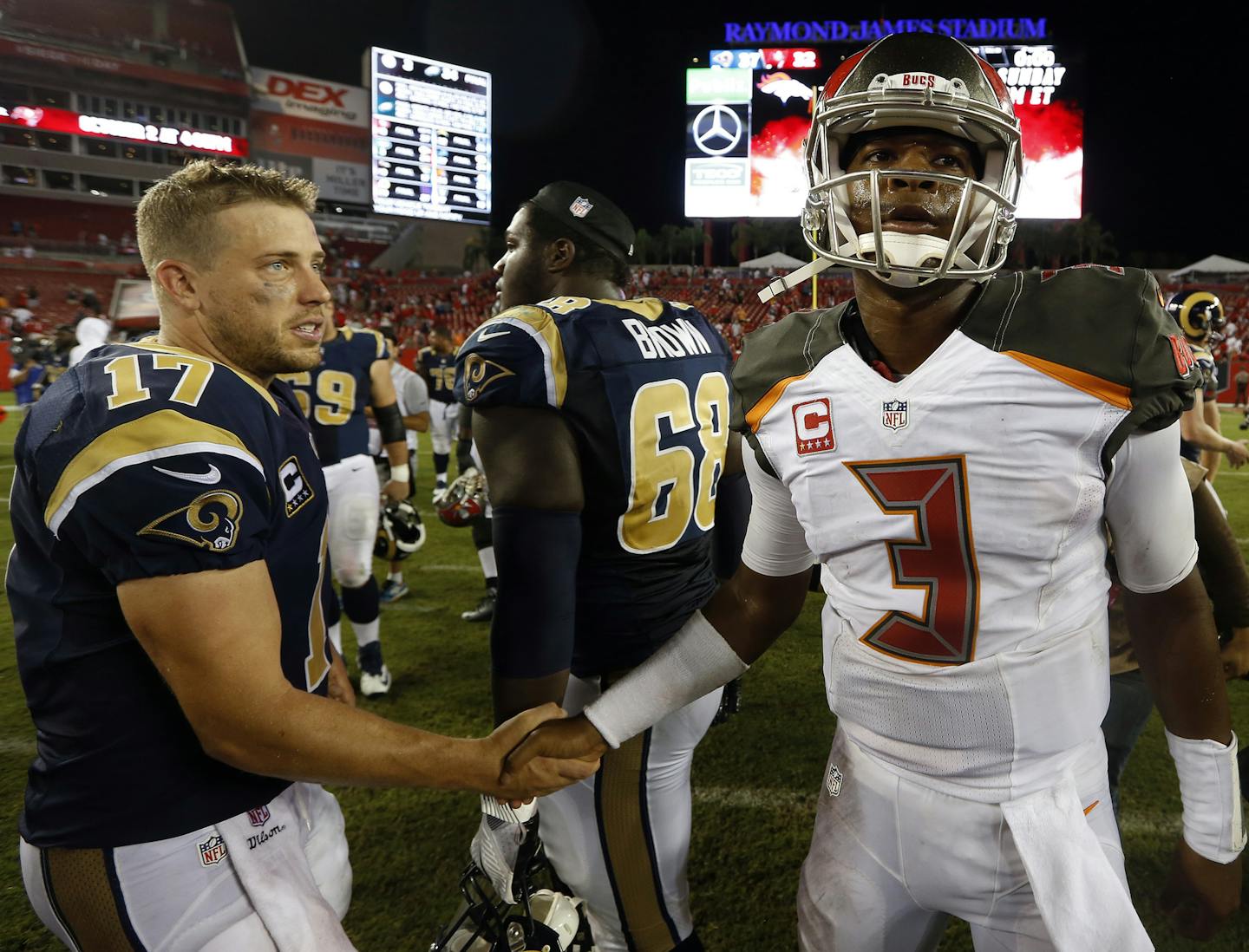 Tampa Bay Buccaneers quarterback Jameis Winston (3) and Los Angeles Rams quarterback Case Keenum (17) shake hands at the end of an NFL football game Sunday, Sept. 25, 2016, in Tampa, Fla. The Rams defeated the Buccaneers 37-32. (AP Photo/Scott Audette) ORG XMIT: TPS120