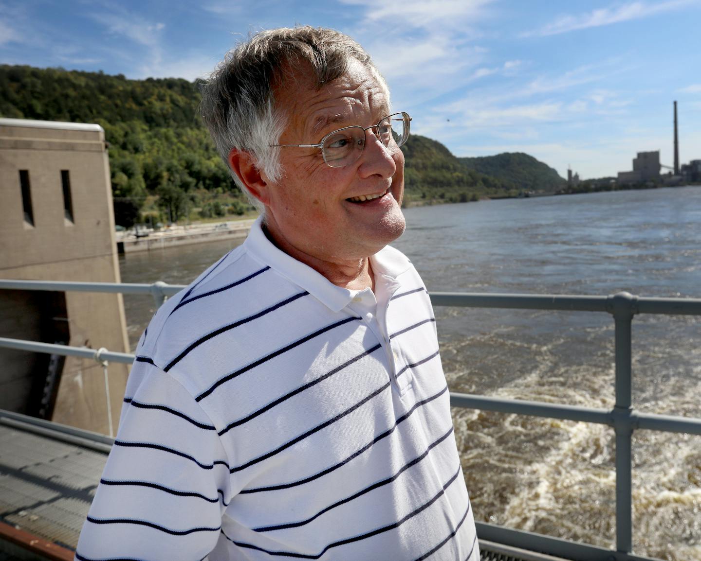 U Professor Peter Sorensen gazed out over the waters in the Mississippi River at Lock and Dam No. 8. He devised the sound-and-light barrier that's being tested.