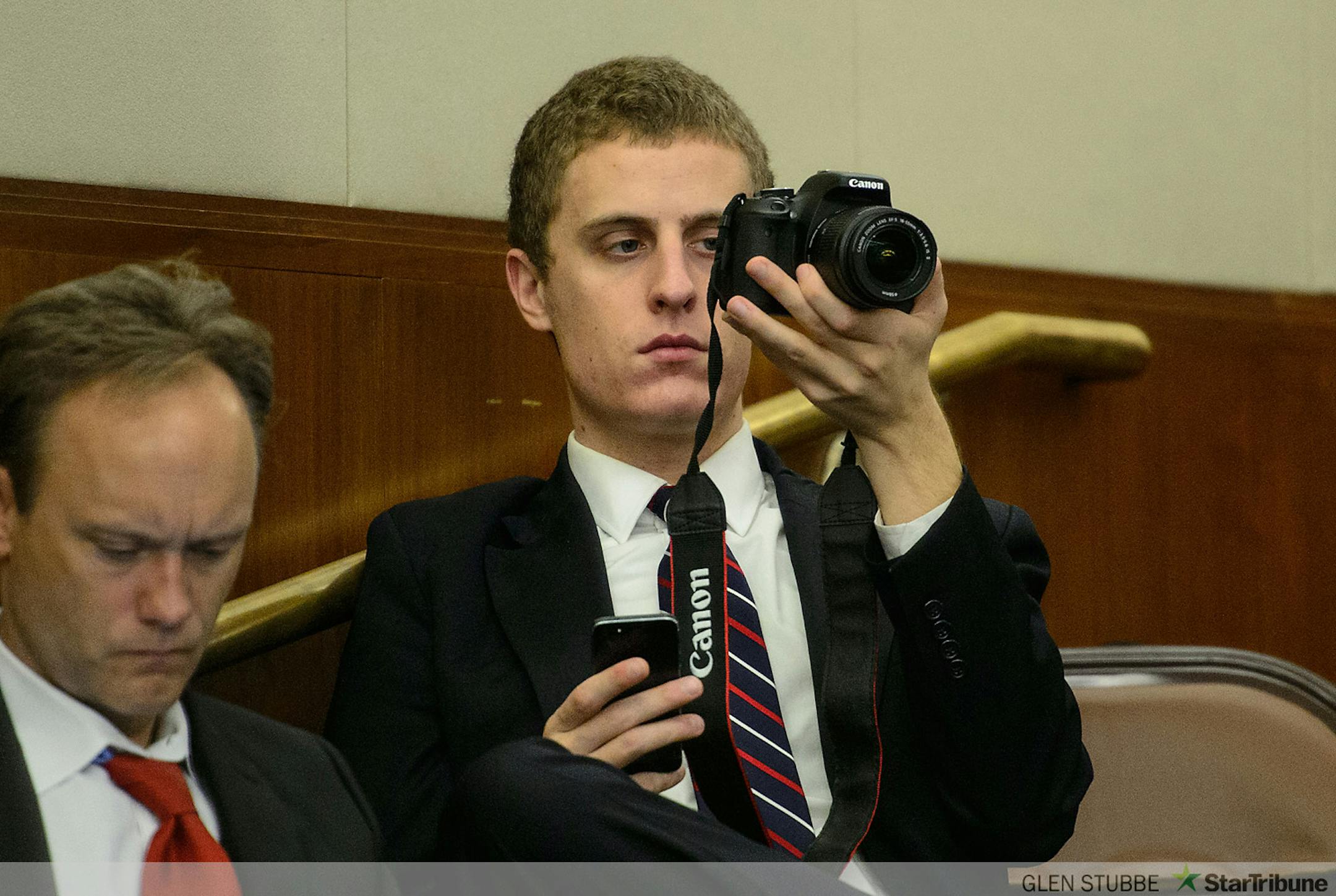 House GOP communications staffer Andrew Wagner recorded the hearing and kept an eye on his iPhone during the MnSure Oversight Committee hearing.         ]   GLEN STUBBE * gstubbe@startribune.com   Wednesday, April 9, 2014
