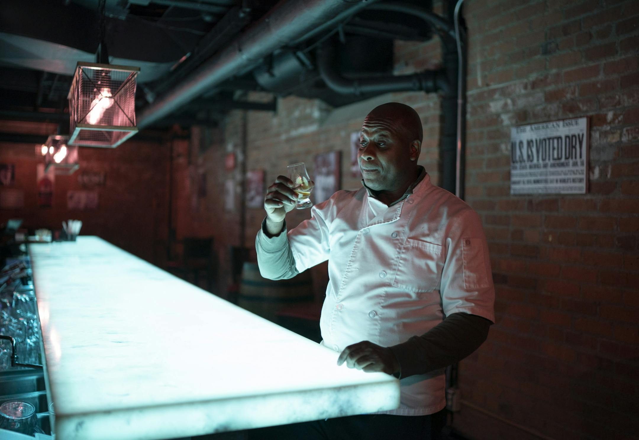 Nucky's Speakeasy co-owner Rowan Brown reacted after tasting a splash of whiskey he'd poured for himself in the basement bar.
