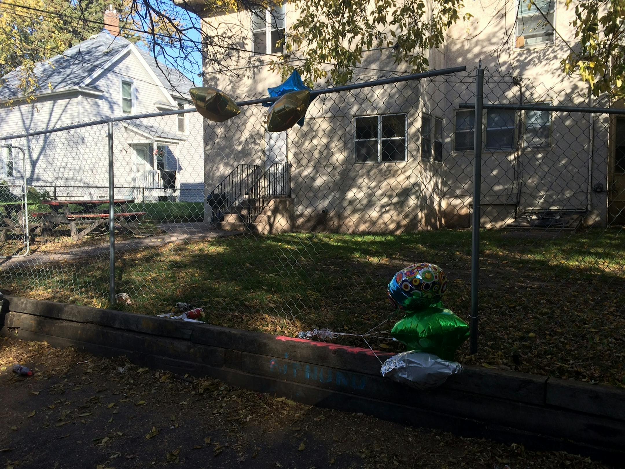 A vigil has been constructed in the alley of the 900 block of Reaney Avenue East in St. Paul.