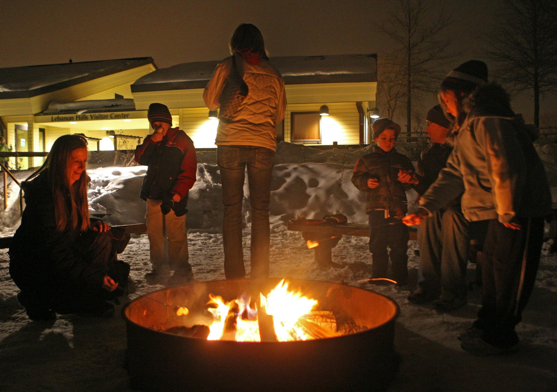 Courtesy of Dakota County Attendees braved the cold to roast marshmallows at February's Forever Wild Family Friday at Lebanon Hills Regional Park.