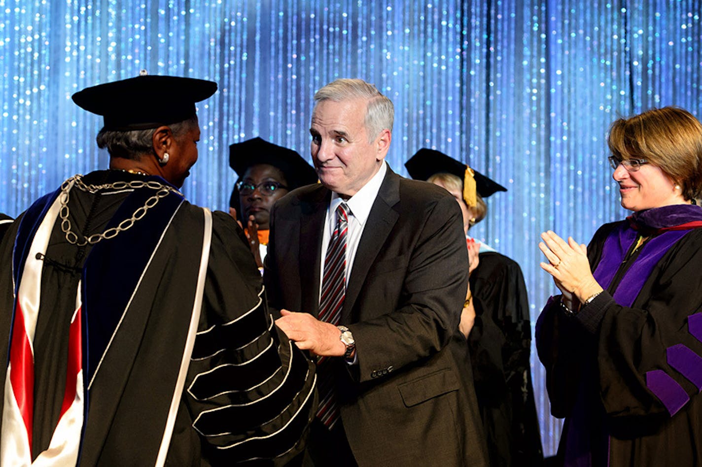 Governor Dayton congratulated Dr. Fayneese Miller at the conclusion of the ceremony.