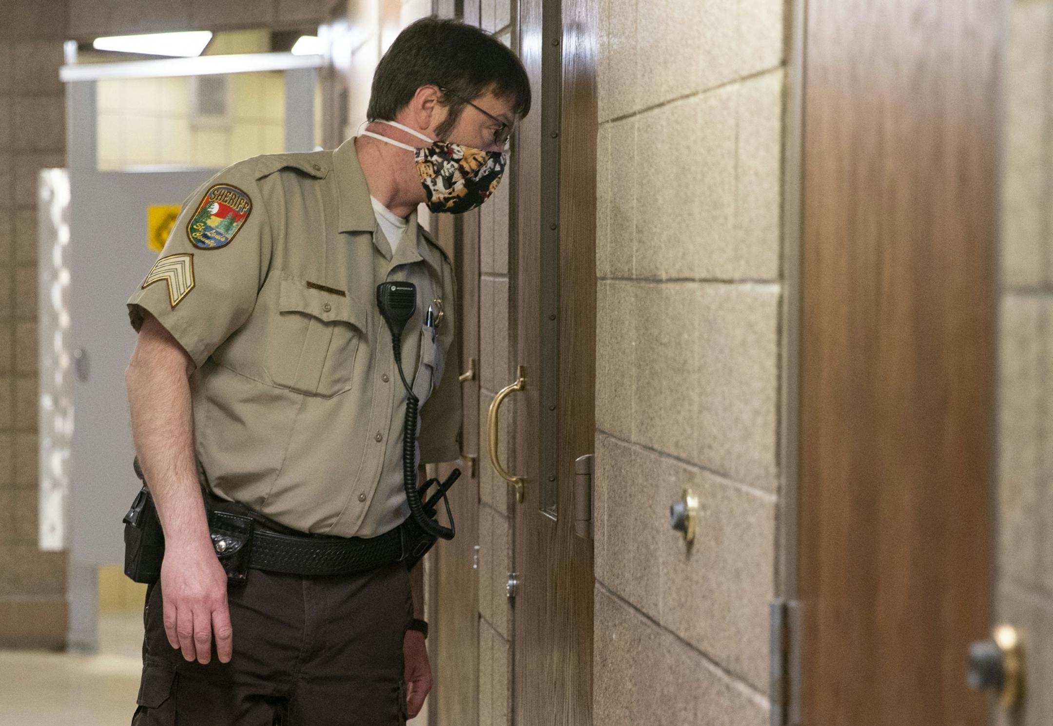 Sergeant Erich Stabs conducted a wellness check on inmates in the St. Louis County jail Tuesday morning.