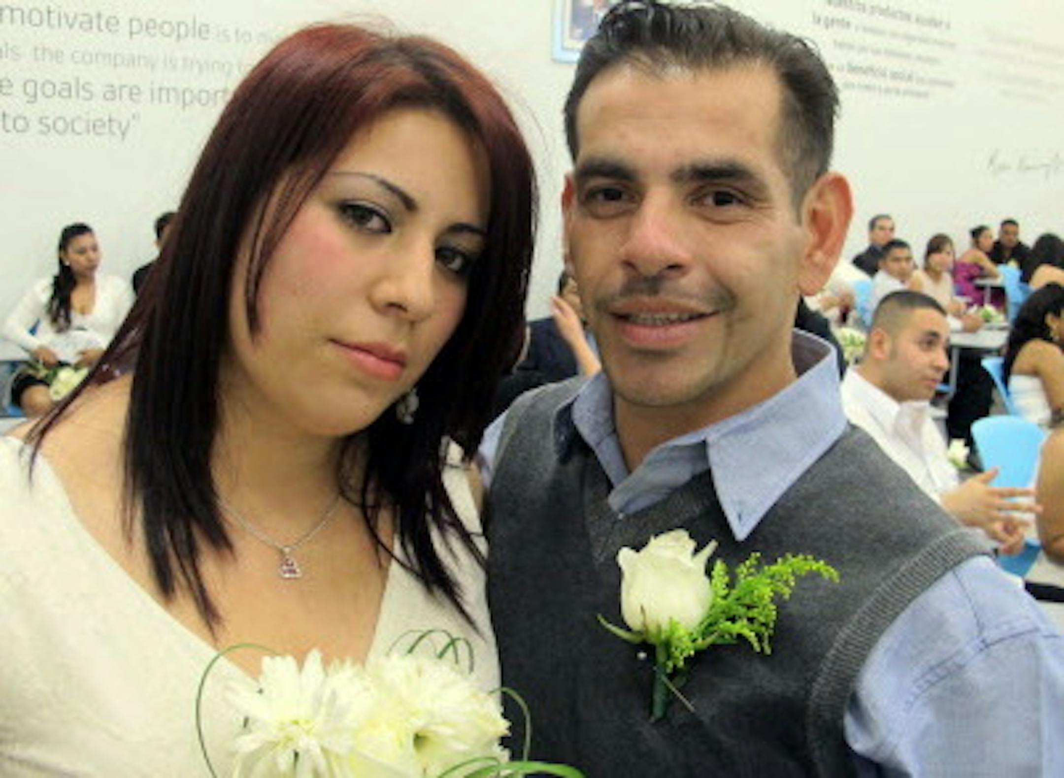 Aracely Saenz, 23, an assembly line worker at the Plantronics factory in Tijuana, Mexico, and her fiance Roberto Reyna, 33, pose before mass nuptials paid for and sponsored by the factory. (Tim Johnson/MCT) ORG XMIT: 1150355