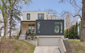 A house in the Linden Hills neighborhood of Minneapolis is unusually sustainable and energy efficient, with a solar-panel system, charging for two ele
