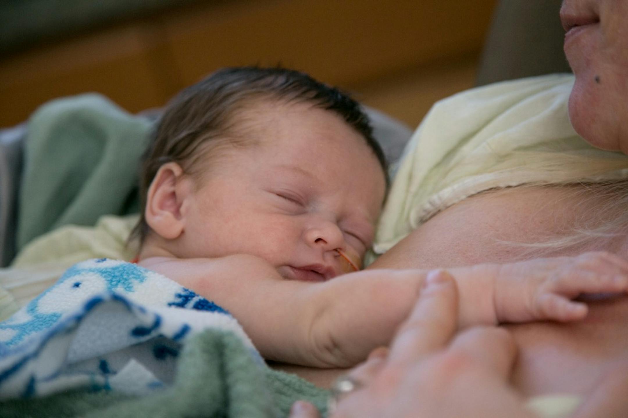 Newborn Azarias has skin-to-skin contact with his mother, Veronica Engel, as part of a Kangaroo Care exercise. Thursday, May 15, is International Kangaroo Care Day.