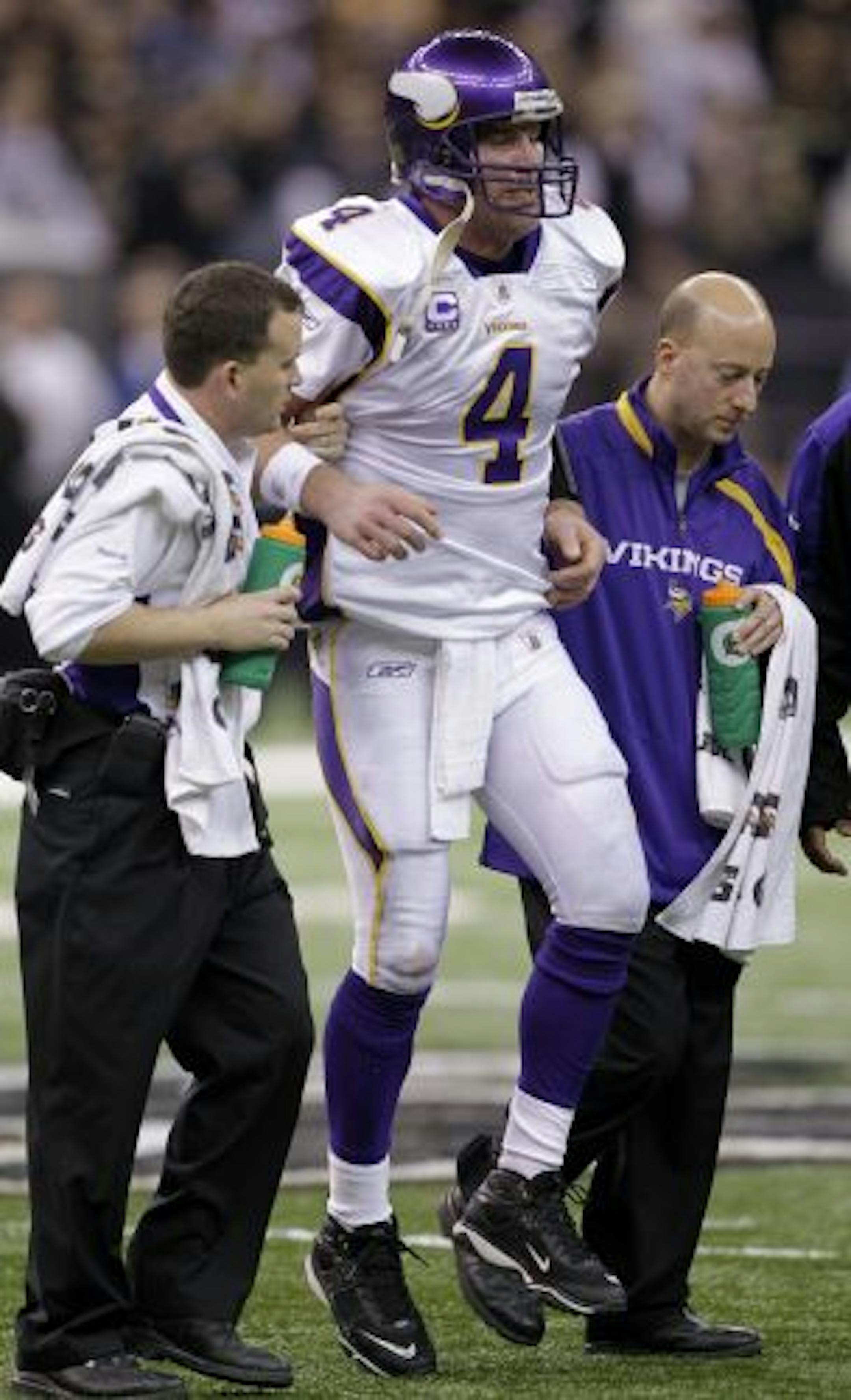 Vikings quarterback Brett Favre was helped off the field after being hit during the third quarter of the NFC Championship game against the New Orleans Saints. Favre's surgery to repair the ankle is one more sign he'll be back.
