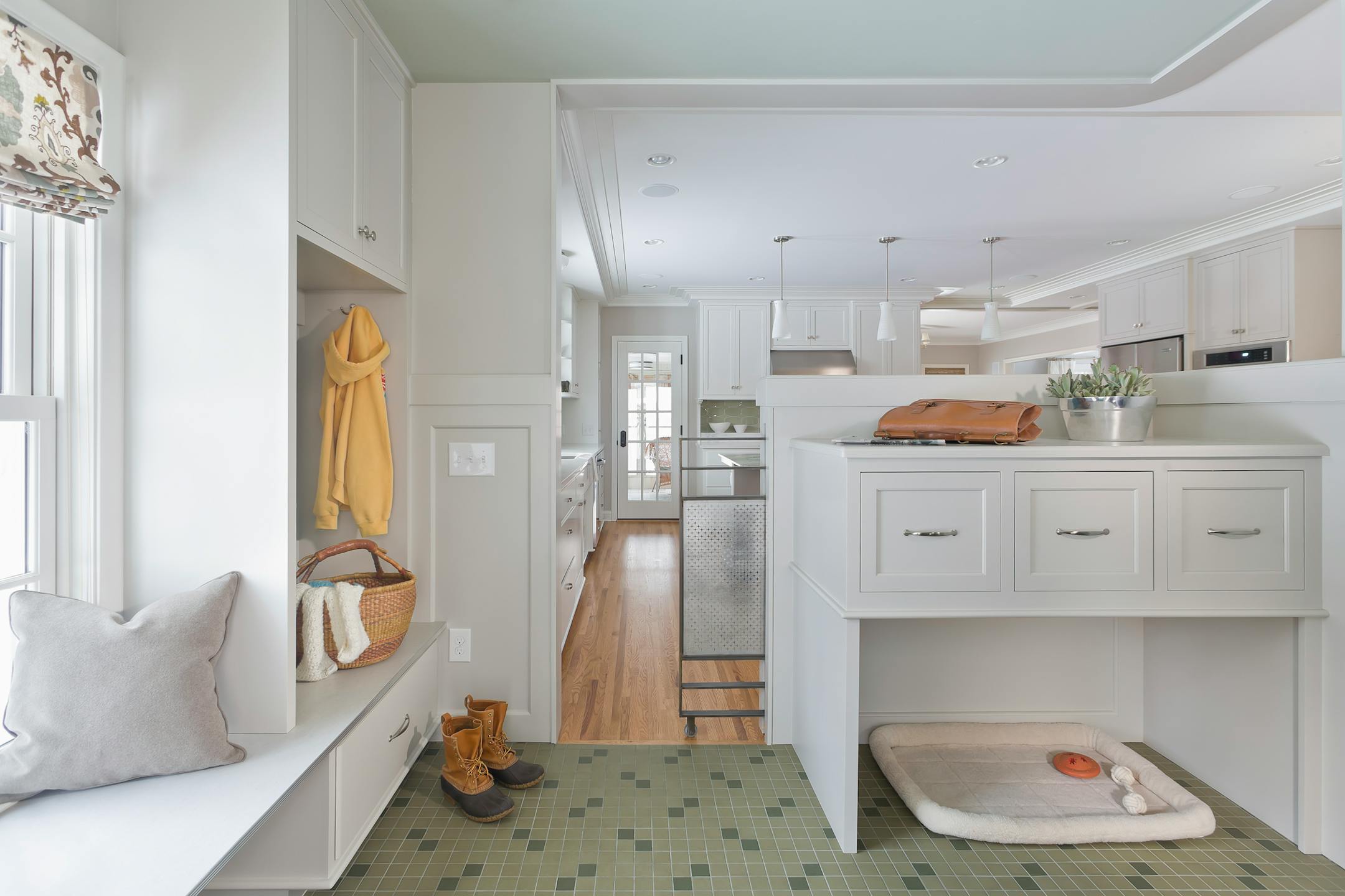 The new mudroom includes storage cubbies, plus space for Lucky, the family dog.