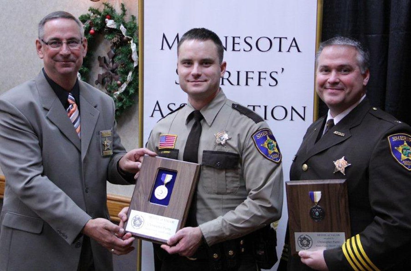 Anoka County Sheriff's Deputy Chris Pierro was awarded the Medal of Valor for saving a man struggling in an icy pond after a car crash.