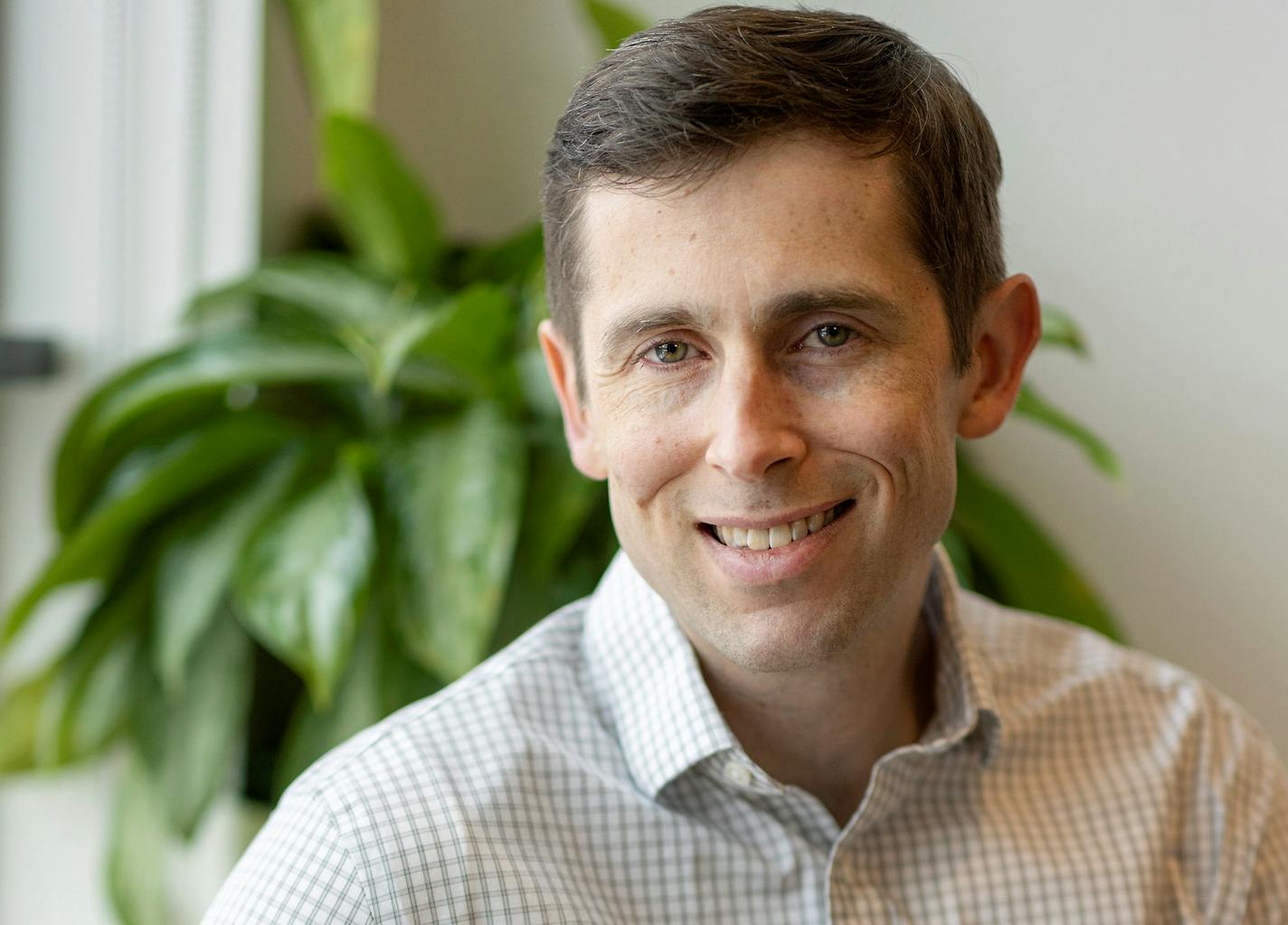 Ethos founder Luke Wilcox, who created a company that collects data so investors know their portfolio of investments are contributing toward good causes like saving the environment or gender equity is photographed on Tuesday, Feb. 15, 2022. ] Elizabeth Flores • liz.flores@startribune.com