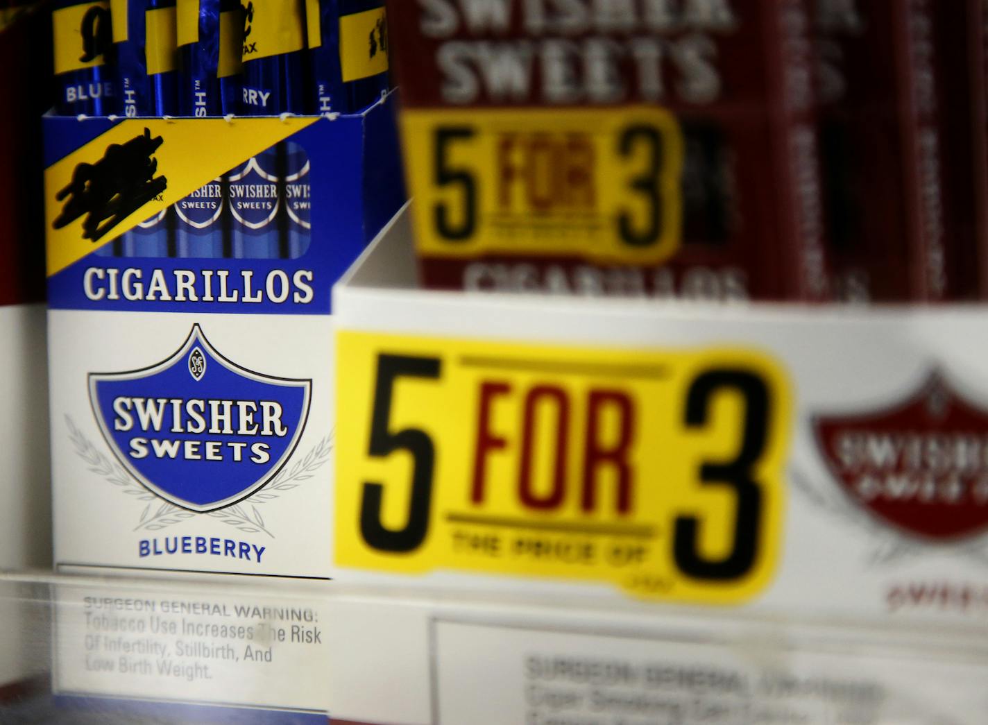 Blueberry flavored cigarillos for sale at the Highland Park BP station in St. Paul. ] CARLOS GONZALEZ cgonzalez@startribune.com - January 6, 2016, St. Paul, MN, St. Paul will vote Wednesday on whether to ban the sale of flavored tobacco products in the city with the exception of specialty stores that only serve customers older than 18. If the council approves the change, it will follow the lead of Minneapolis and other cities