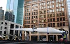 Xcel installed a real wind turbine blade outside its headquarters on Nicollet Mall.