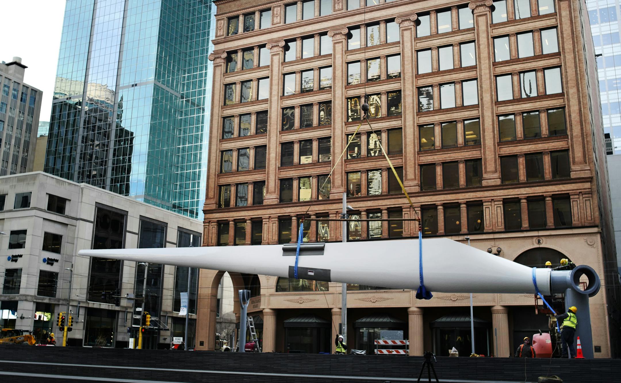 Xcel installed a real wind turbine blade outside its headquarters on Nicollet Mall.