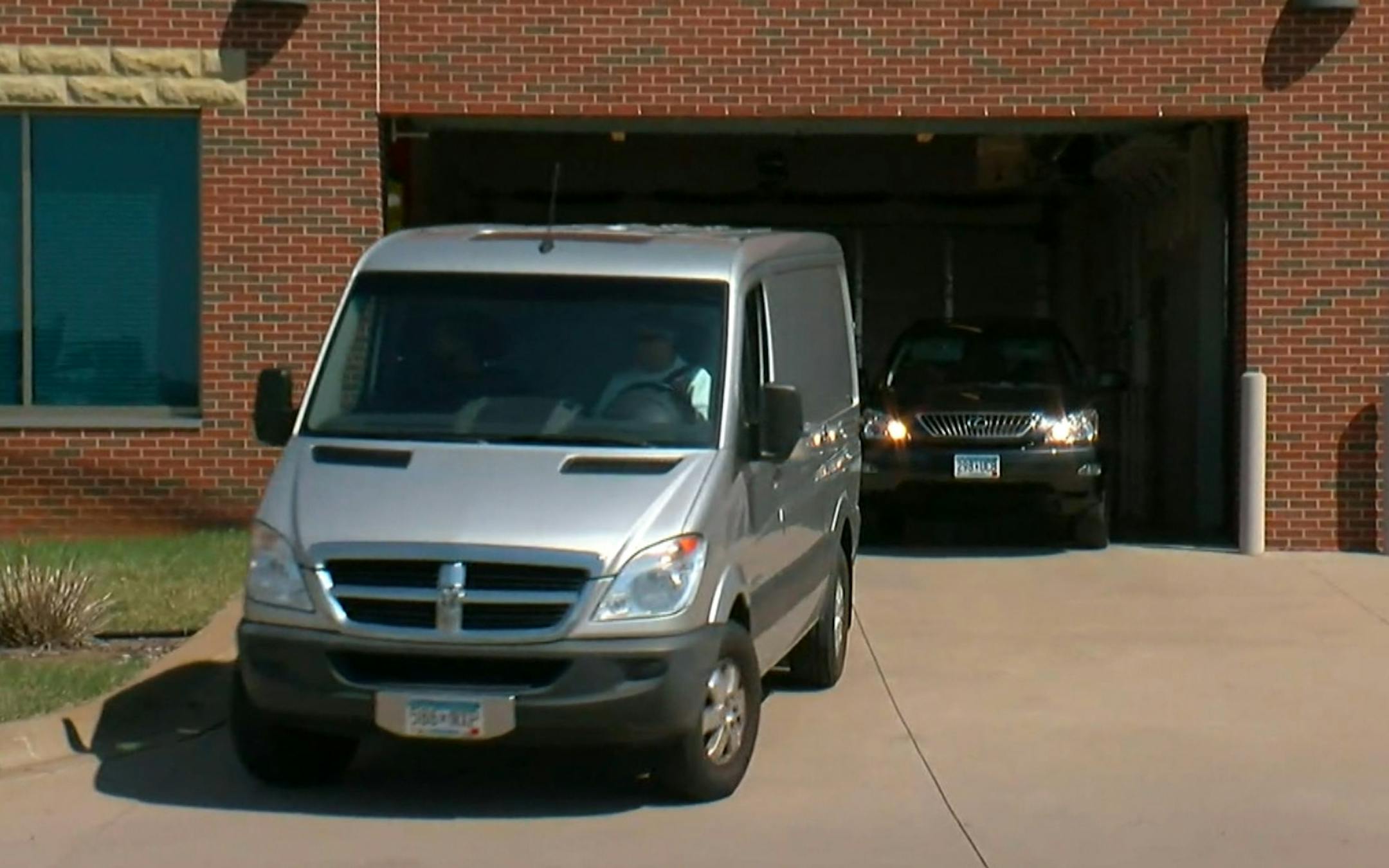 The gray van leaving the Medical Examiner's Office today in Ramsey, MN. (04/22/2016) The gray van is believed to have the remains of Prince inside. Mandatory credit: WCCO-TV note...must credit for online and print usage. dd