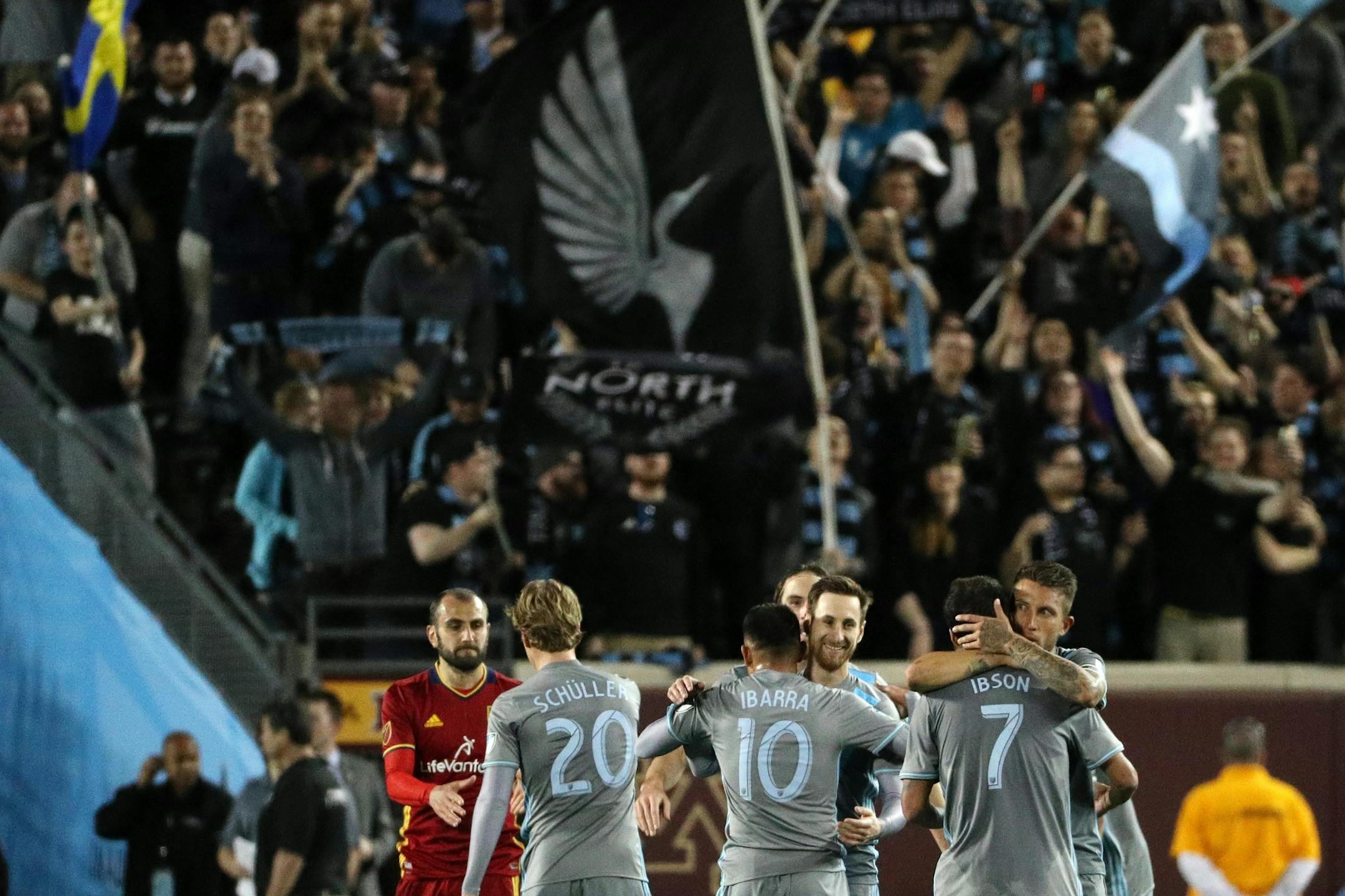 Minnesota United players including Minnesota United midfielder Ibson (7) and defender Francisco Calvo (5) celebrated the win.