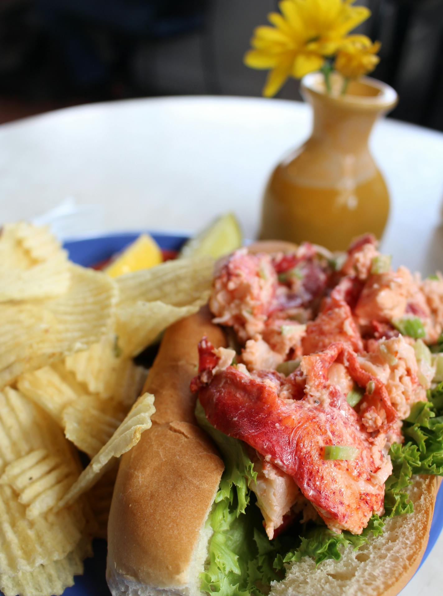 The lobster roll -- a favorite in this part of the world, including Martha's Vineyard -- at Among the Flowers Cafe, a little place near the ferry landing at Edgartown, Mass. (Alan Solomon/Chicago Tribune/TNS)