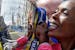 Rita Jeptoo of Kenya poses with her trophy at the finish line after winning the women's division of the 2013 Boston Marathon in Boston Monday, April 1
