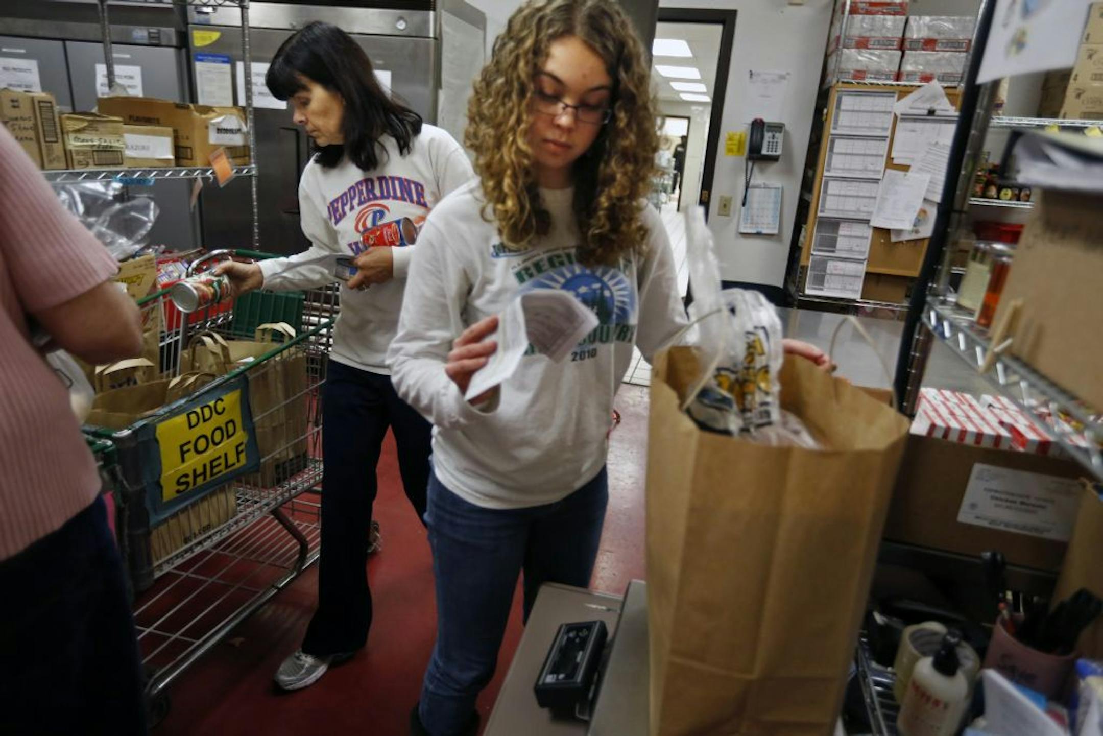 2012 photo: Volunteers at the Dorothy Day Center run by Catholic Charities in St. Paul, volunteers.