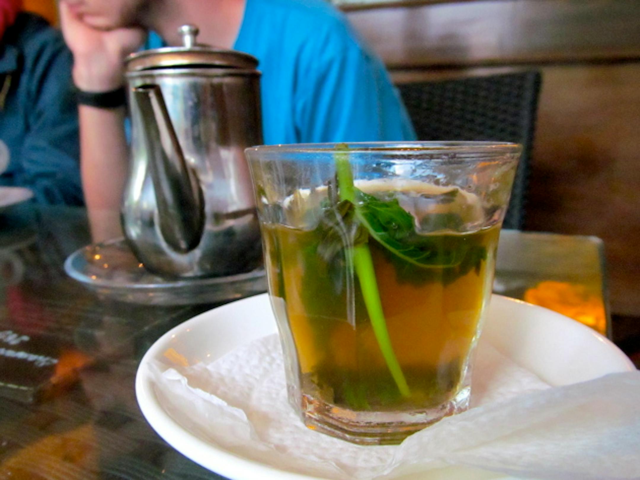 A glass of mint tea, served at a café in Fes.