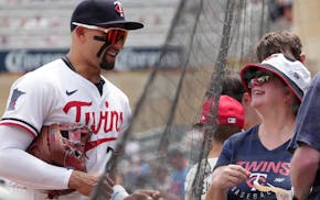 The Twins' Royce Lewis, hitting .368 in June after two singles Sunday, greets fans at Target Field on Saturday.