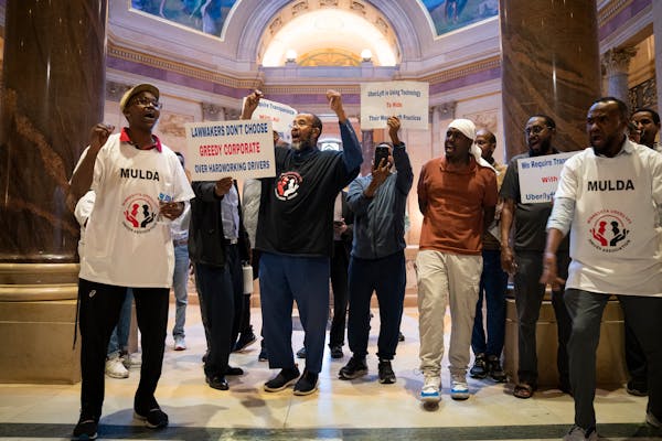 Uber/Lyft drivers rally at the Minnesota State Capitol in St. Paul on Friday, May 17.