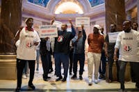 Uber/Lyft drivers rally at the Minnesota State Capitol in St. Paul on Friday, May 17.