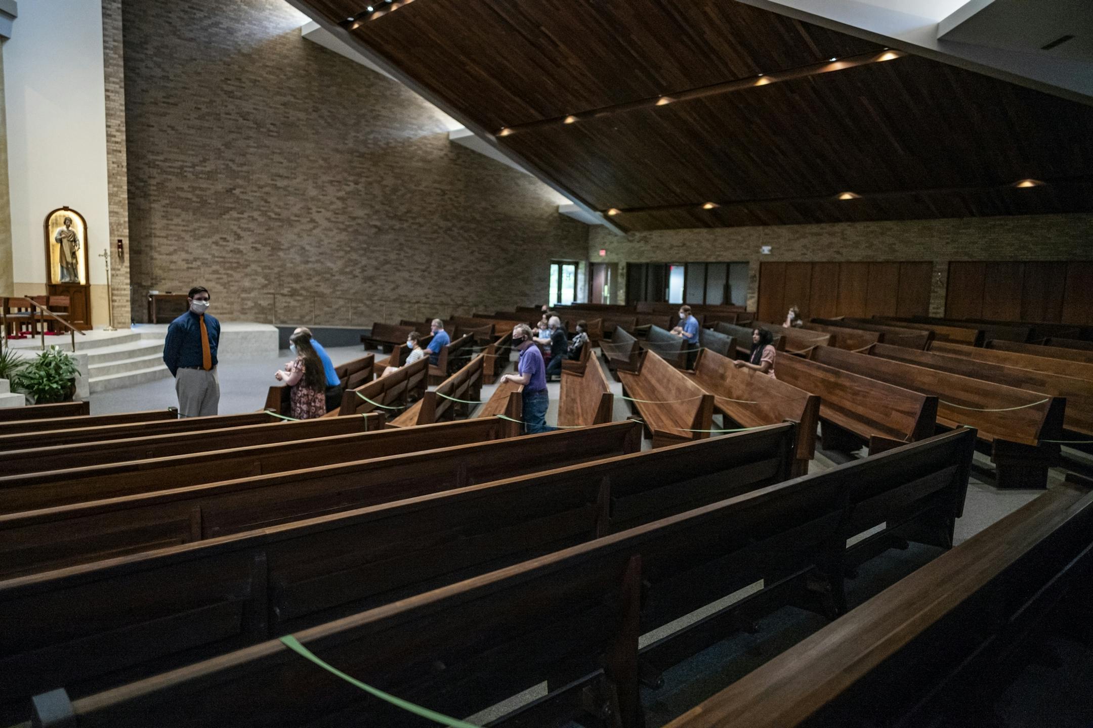 Parishioners were able to attend a service presided by Father John Paul Erickson as pews were closed off to allow social distancing and a maximum capacity of 250 or less than 25%.