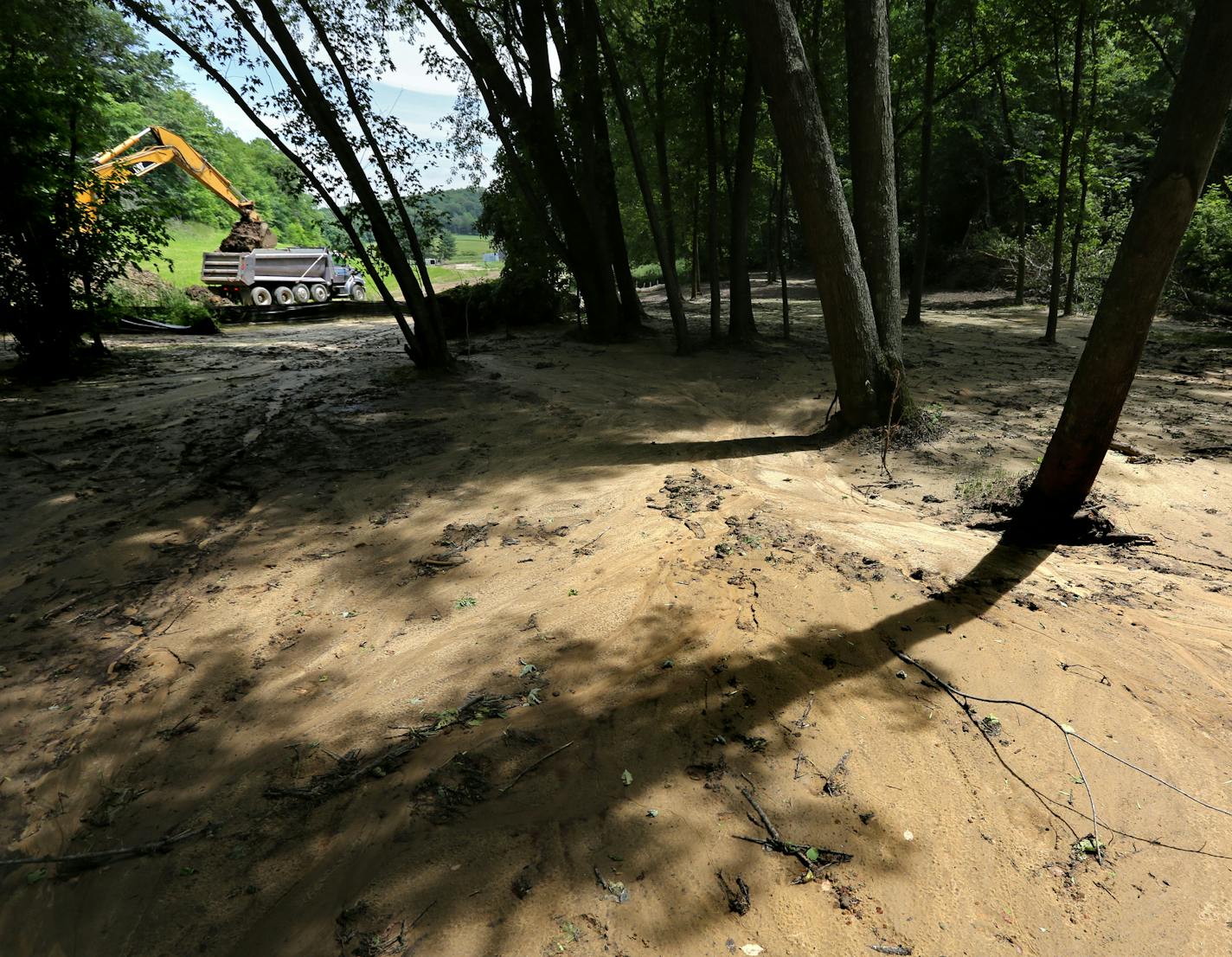 Four years into an industrial sand mining boom that is literally reshaping the countryside in parts of both states, frac sand companies and government regulators are scrambling to understand, much less control, the various waste streams that the mines create. From slippery stockpiles of discarded sand to the sludge that accumulates in the bottom of holding ponds, the mines create tons of junk that must be managed until they are put back into the ground according to land reclamation plans that ha