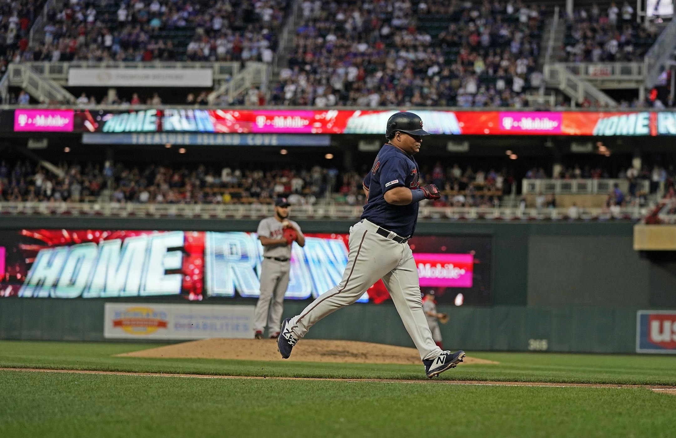 Minnesota Twins catcher Willians Astudillo (64) hits a home run in the fourth inning.