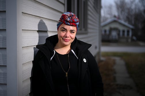 Tasha Nins was photographed outside her home in St. Paul, Minn.