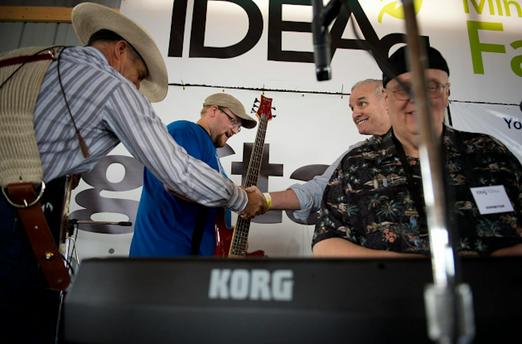 Governor Mark Dayton greeted members of Uncle Roy and the Boys who provided entertainment before he spoke at Farmfest.  Dayton   delivered the keynote speech at Farmfest the outstate agricultural trade show held each year at Gilfillian Estate in Redwood County, Minnesota,  Thursday August 8, 2013   ]   GLEN STUBBE * gstubbe@startribune.com