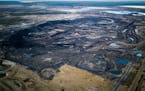 -- PHOTO MOVED IN ADVANCE AND NOT FOR USE - ONLINE OR IN PRINT - BEFORE NOV. 13, 2016. -- FILE -- An oil sands strip mine, north of Fort McMurray, Alb