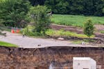 The west bank of the river at the Rapidan Dam has seen major erosion from the flood in Mankato, Minn., on Tuesday, July 2, 2024.