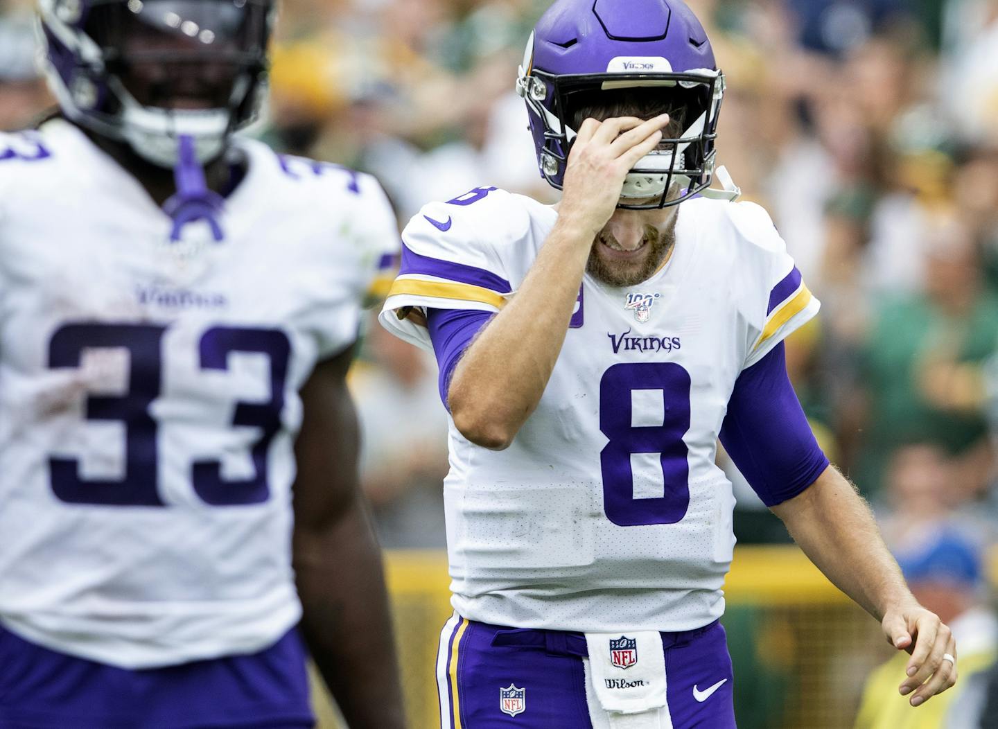 Vikings quarterback Kirk Cousins walked back to the sidelines after throwing an interception in the end zone during the fourth quarter.