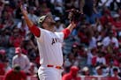 Los Angeles Angels relief pitcher Carlos Estevez celebrates after the Angels defeated the Minnesota Twins 4-2 in a baseball game Sunday, May 21, 2023,