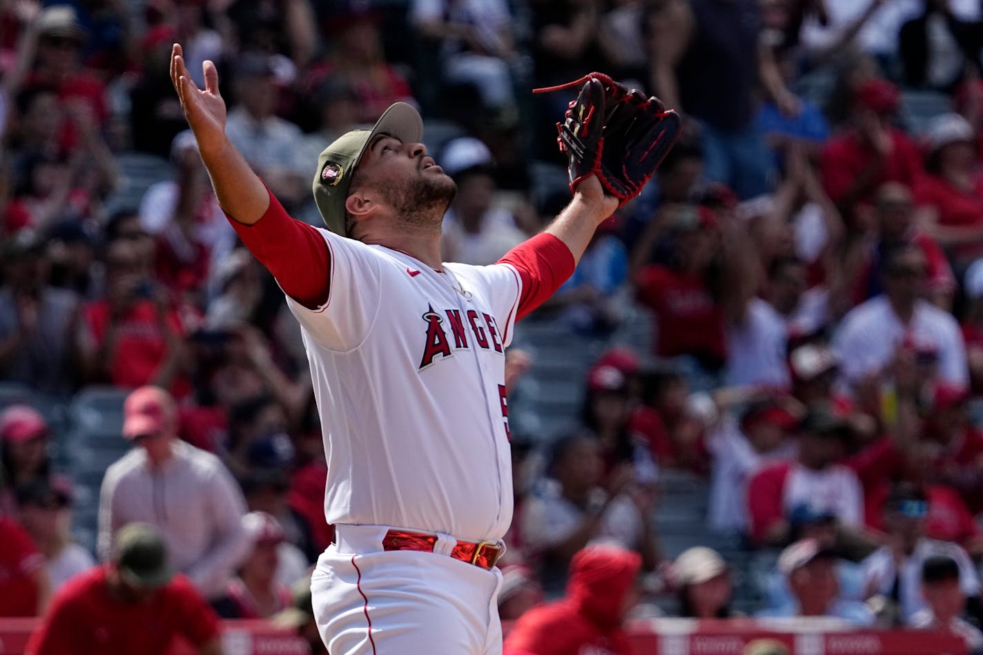 Los Angeles Angels relief pitcher Carlos Estevez celebrates after the Angels defeated the Minnesota Twins 4-2 in a baseball game Sunday, May 21, 2023, in Anaheim, Calif. (AP Photo/Mark J. Terrill)