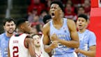 North Carolina’s Sterling Manley reacts following his basket and a foul against North Carolina State 
