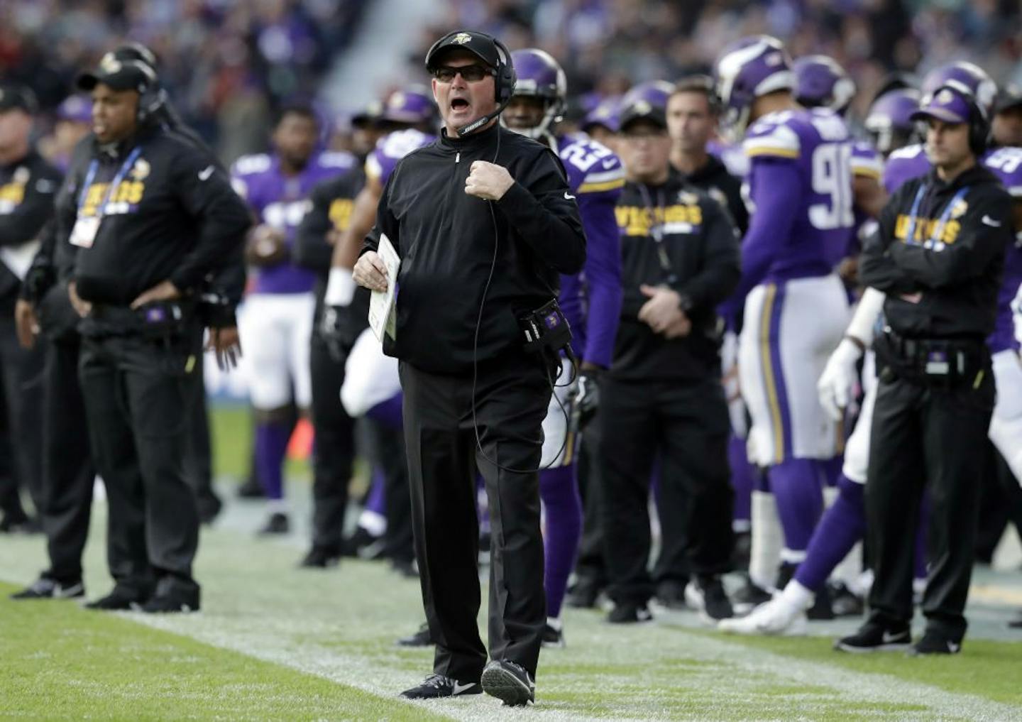 Minnesota Vikings head coach Mike Zimmer shouts out during the first half of an NFL football game against the Cleveland Browns at Twickenham Stadium in London, Sunday Oct. 29, 2017.