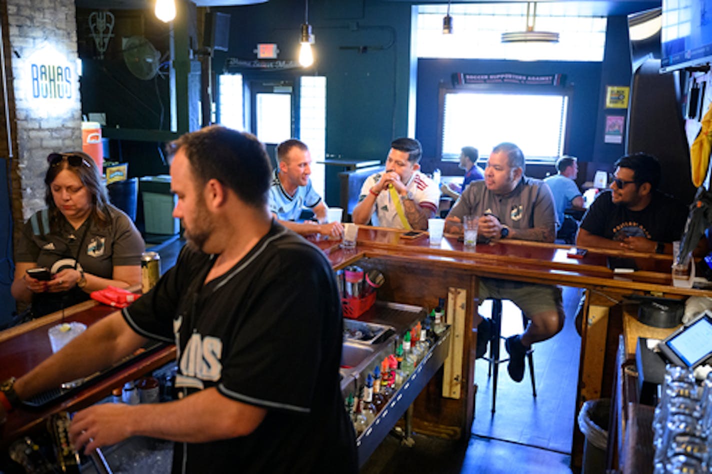 The Black Hart of Saint Paul bar off of University Avenue across from Allianz Field is busy with customers Wednesday, Aug. 10, 2022 in St. Paul, Minn. The neighborhood surrounding Allianz Field buzzes with excitement and frustration on MLS All-Star night. ] aaron.lavinsky@startribune.com