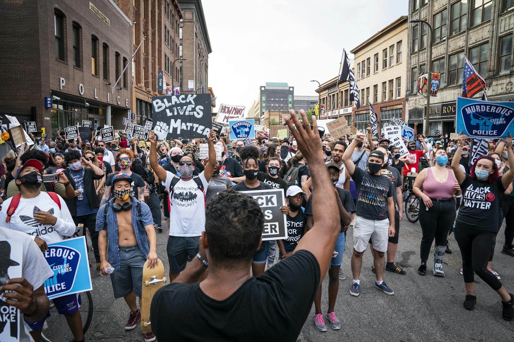 Protesters rallied downtown in front of the Minneapolis Police Department's First Precinct. ] LEILA NAVIDI • leila.navidi@startribune.com BACKGROUND INFORMATION: A solidarity rally and march for Jacob Blake started in front of the Hennepin County Government Center in downtown Minneapolis on Monday, August 24, 2020.