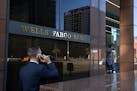A pedestrian walks past a Wells Fargo bank in downtown Los Angeles on Feb. 5, 2018. (Mel Melcon/Los Angeles Times/TNS)