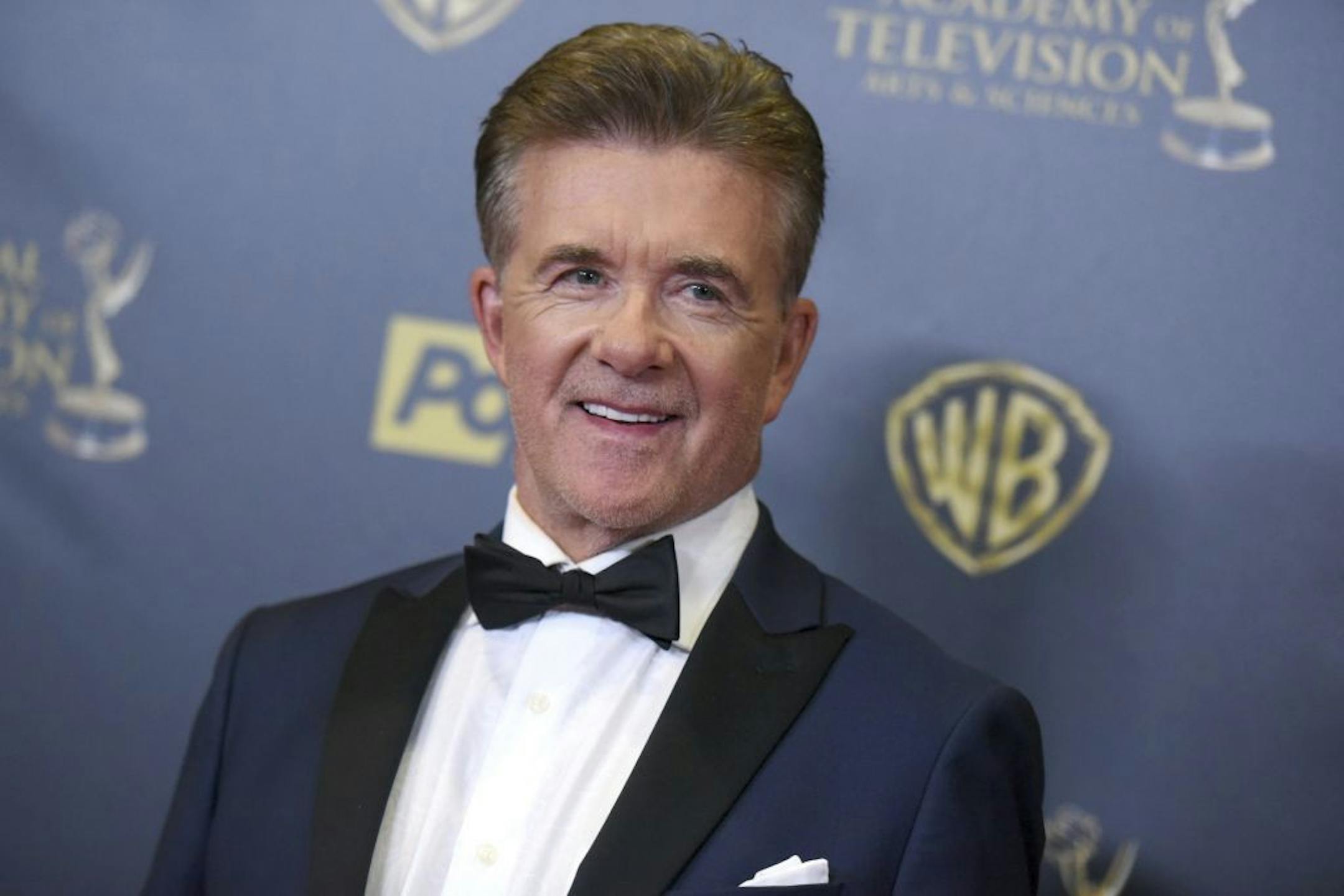 FILE - In this Sunday, April 26, 2015 file photo, Alan Thicke poses in the pressroom at the 42nd annual Daytime Emmy Awards at Warner Bros. Studios in Burbank, Calif. On Tuesday, Dec. 13, 2016, a publicist said the actor has died at the age of 69.