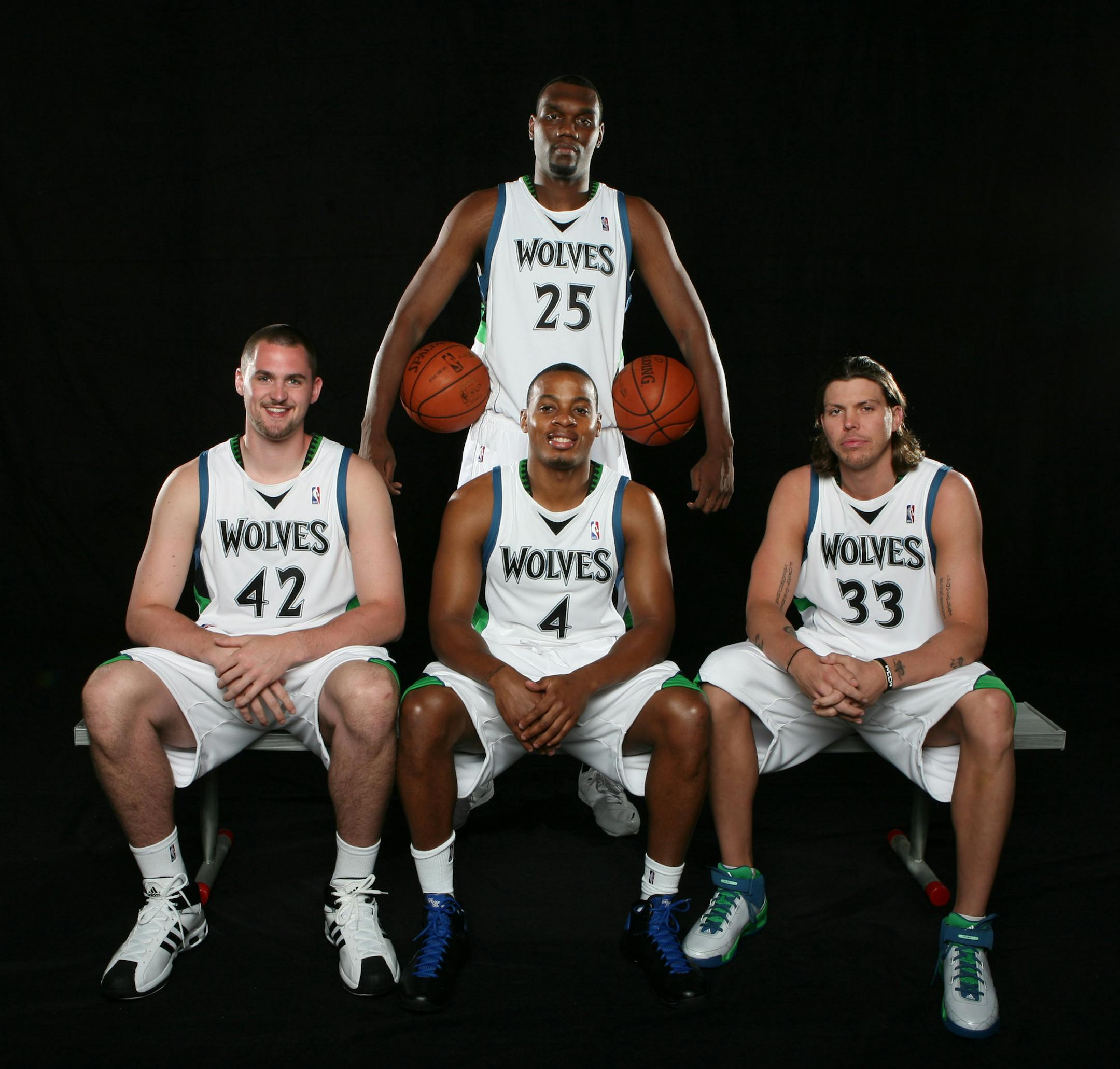 JERRY HOLT ïjgholt@startribune.com 9/29/2008---] Timberwolves players Al Jefferson standing, Kevin Love left, Randy Foye , and Mike Miller. ORG XMIT: MIN2014082221284381