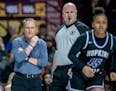 Hopkins' Head Coach Brian Cosgriff on the court as the team took on Cambridge-Isanti in the Class 4A girls' basketball quarterfinals at Williams Arena