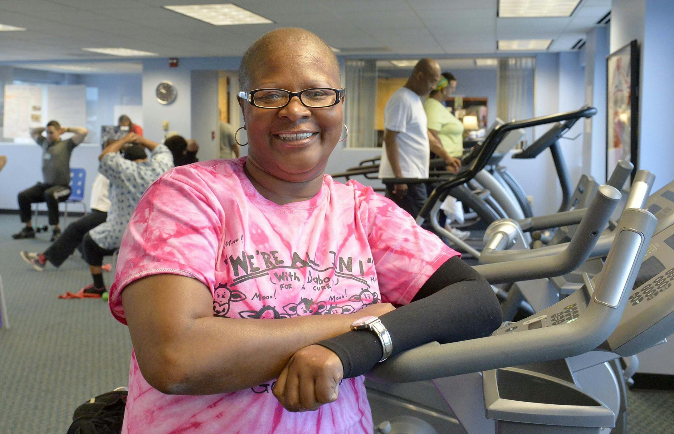 Esther Craig, 55, participates in an exercise class on Sept. 29, 2014, at the Dowd YMCA as part of the Levine Cancer Institute Cancer Wellness Program. Craig had a lump in her breast for several months before she finally sought treatment, due to lack of insurance. By the time she was diagnosed, her cancer had advanced to Stage IV. She has already been through treatment. (Robert Lahser/Charlotte Observer/MCT) ORG XMIT: 1158403