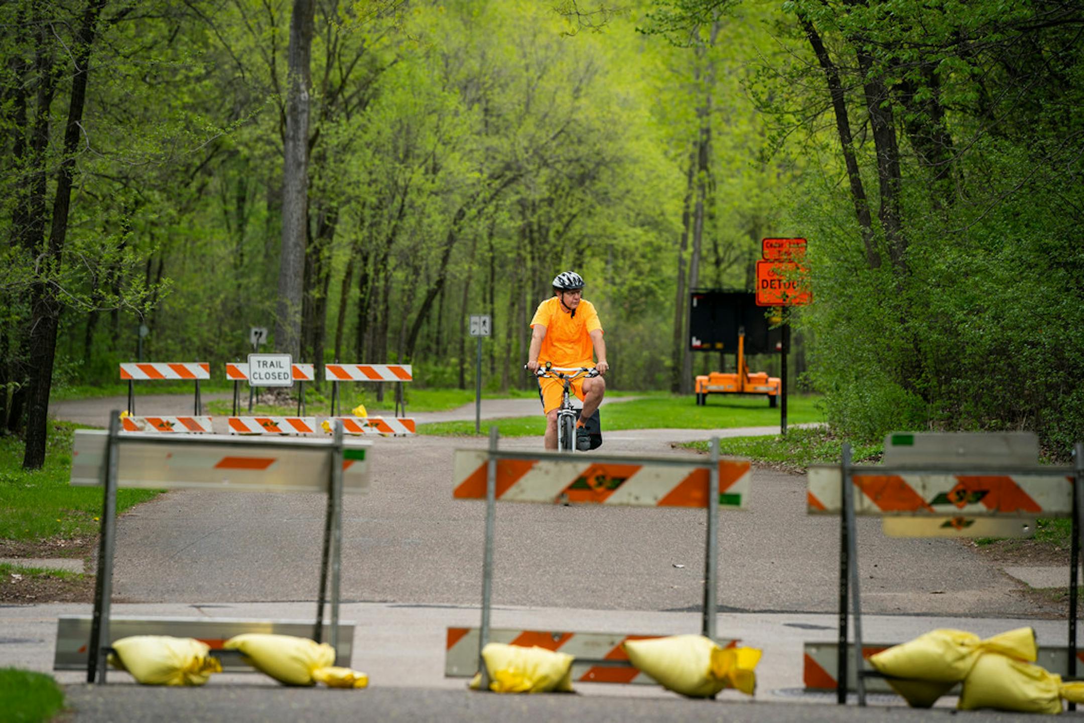 The closed part of Kenilworth Trail due to light-rail construction,. "We were hearing beeping trucks backing up early Saturday, and a lot of commotion," said Kenwood resident Courtney Kiernat, whose backyard borders the trail.